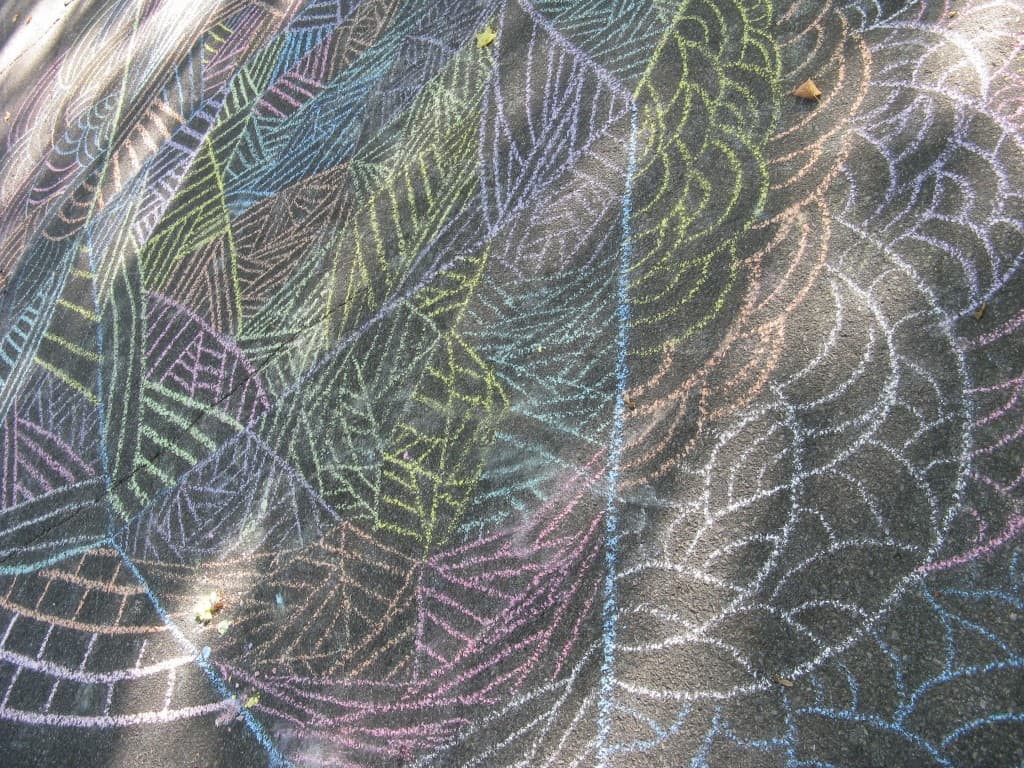 Sidewalk chalk had a new canvas - the entire road - at our block party.